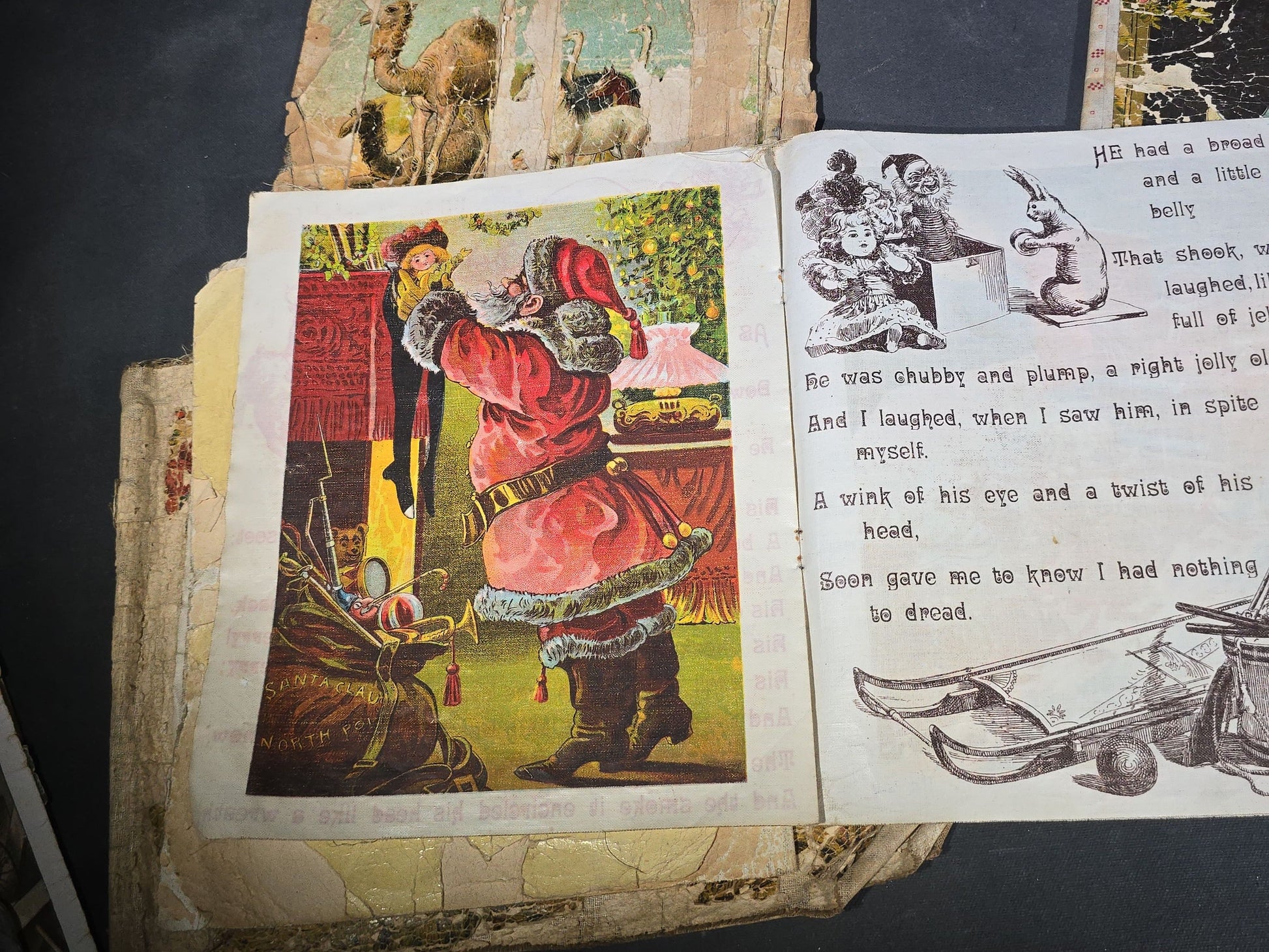 Grouping of Antique Craft Grade Illustrated Children's Books including "The Christmas Basket" by Mrs. Martha J. Lamb (1882), "Santa Claus & His Works" by McLoughlin Bros., "The Night Before Christmas," and Dean's Rag Book "Pets"