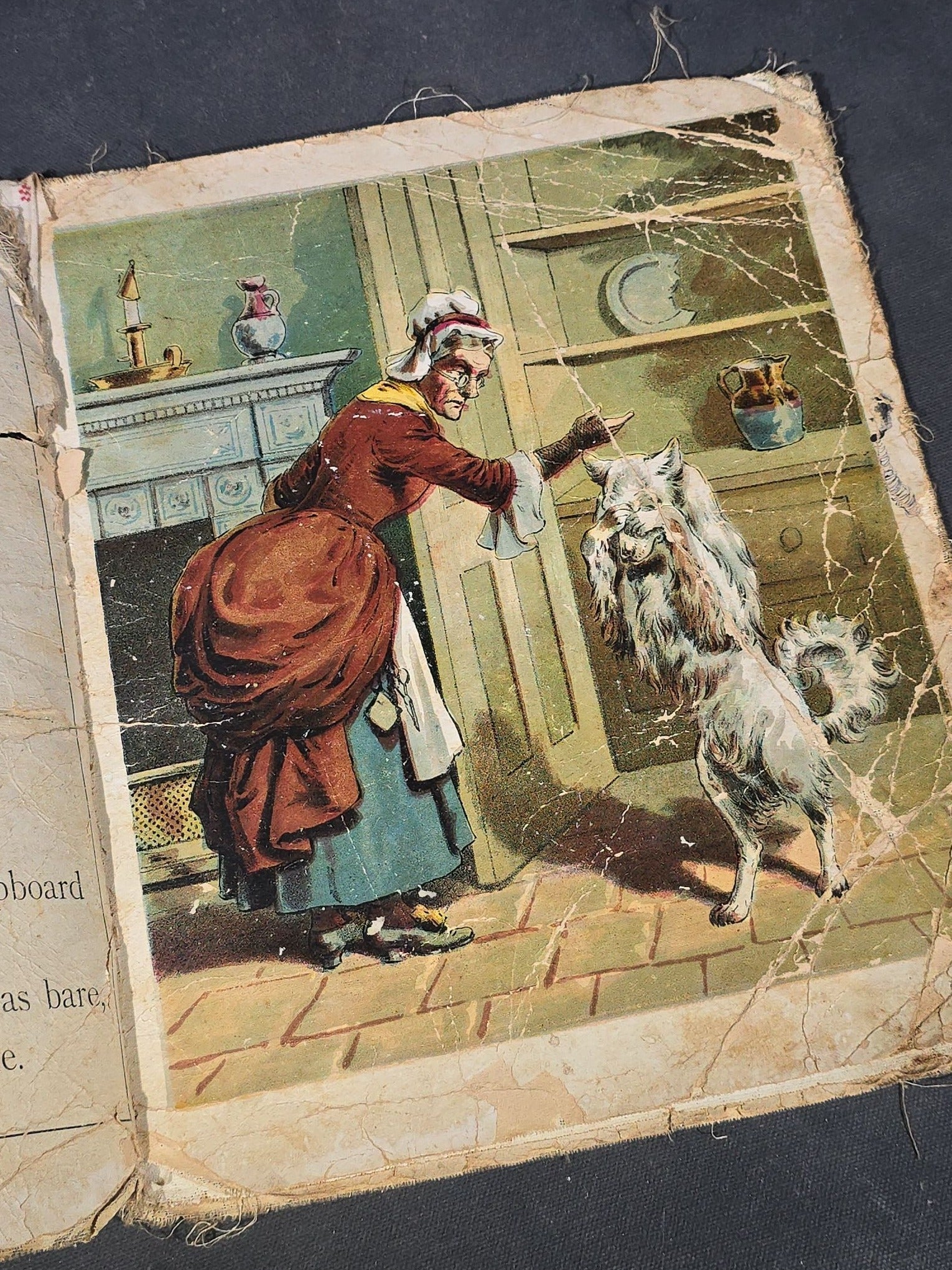 Grouping of Antique Craft Grade Illustrated Children's Books including "The Christmas Basket" by Mrs. Martha J. Lamb (1882), "Santa Claus & His Works" by McLoughlin Bros., "The Night Before Christmas," and Dean's Rag Book "Pets"