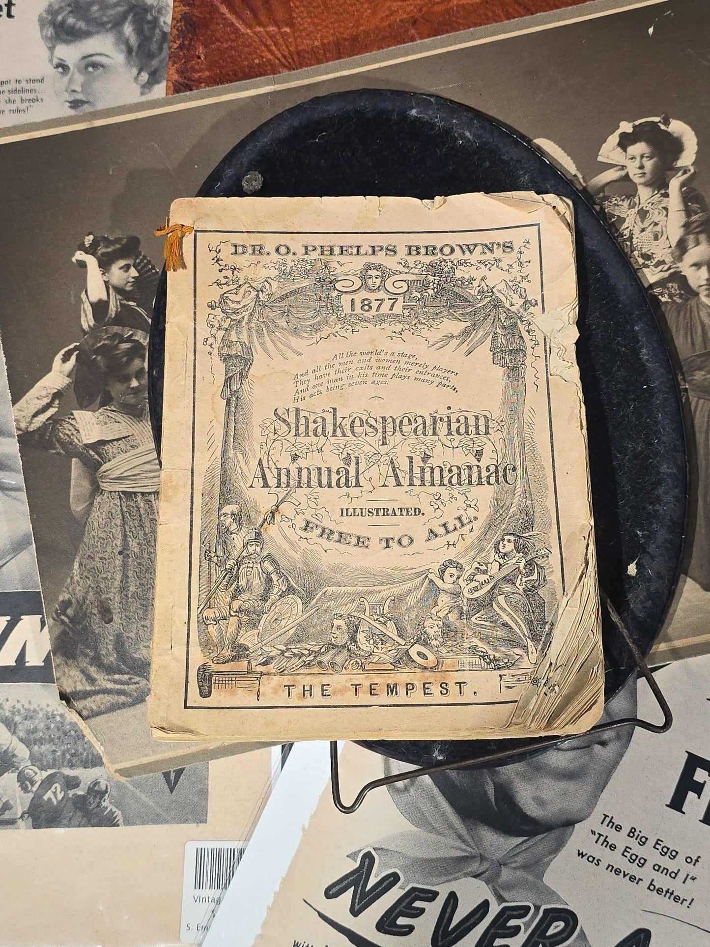 Grouping of Antique and Vintage Ephemera including 1877 "Shakespearian Annual Almanac" by Dr. O. Phelps Brown, "Grandma's Attic Treasures" Embossed Leather Book, Vintage Movie Advertisement Pages, and Celluloid Photo Oval Portrait Button