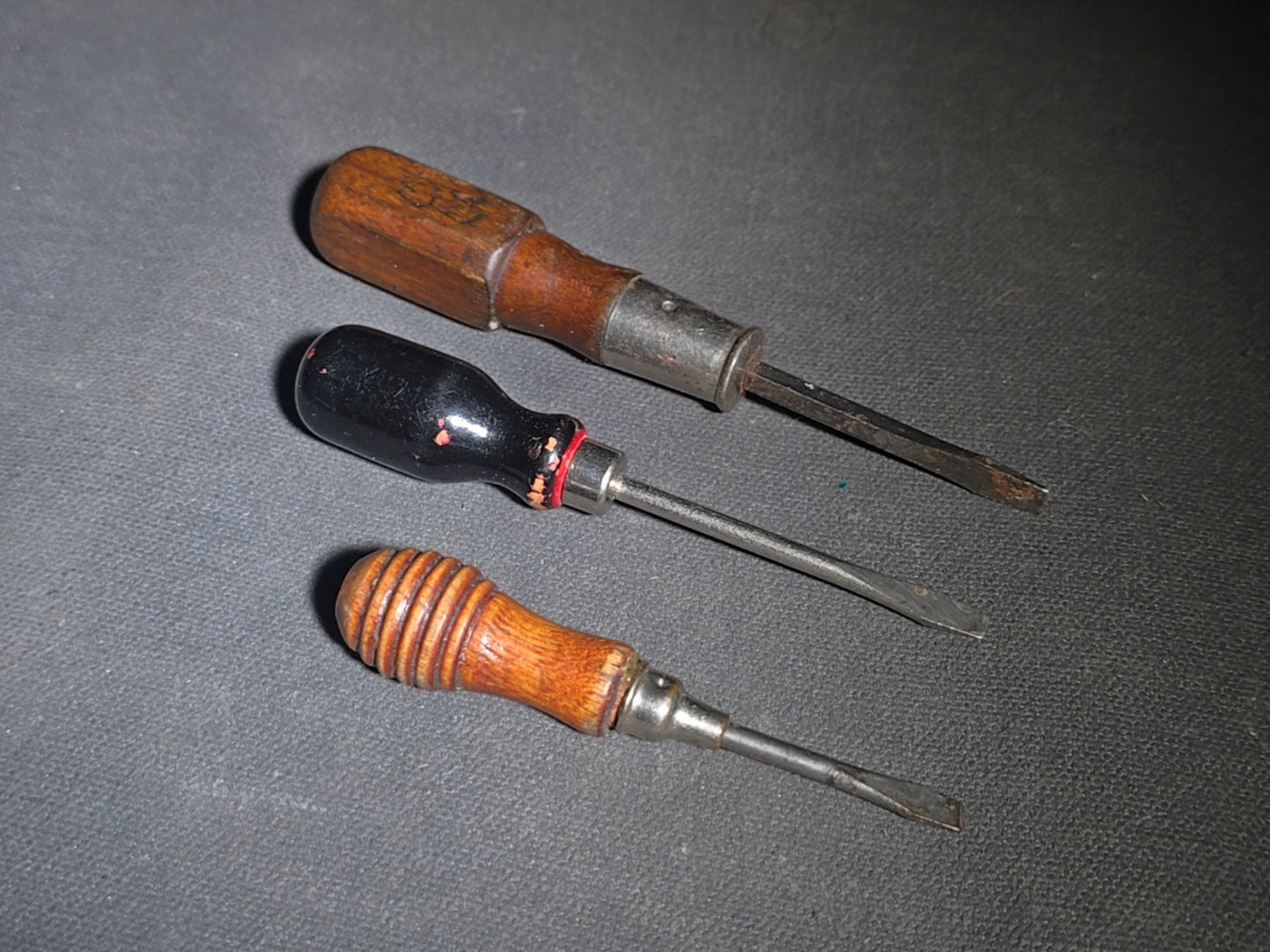 Grouping of Five Vintage Tools including Kellogg Quality 255 Whisk Broom, Turned-Handle Whisk Broom, and Three Miniature Wood-Handled Flathead Screwdrivers