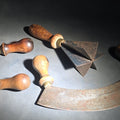Lot 087 - Trio of Antique Kitchen Tools Including Two Mezzaluna Chopping Knives and a Cross Blade Food Chopper