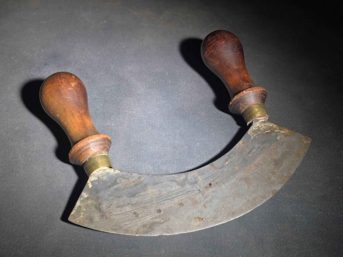 Trio of Antique Kitchen Tools including Two Mezzaluna Chopping Knives and a Cross Blade Food Chopper