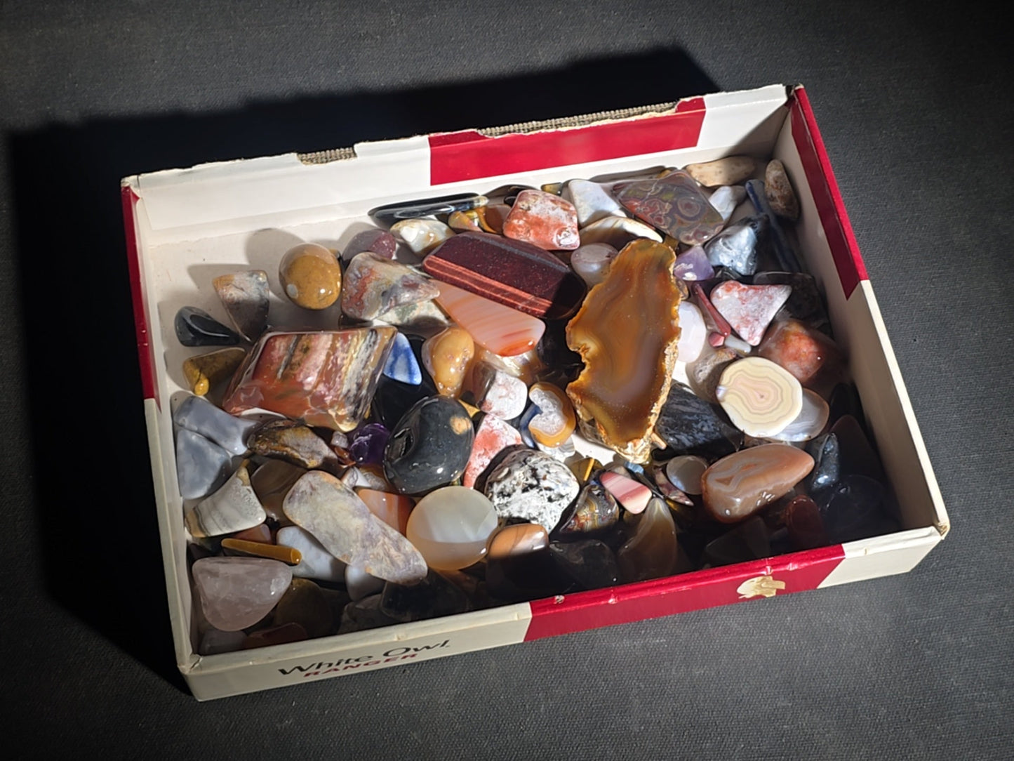 Grouping of Polished Stones and Mineral Specimens including Agate Slices, Tiger's Eye, Jasper, and Amethyst