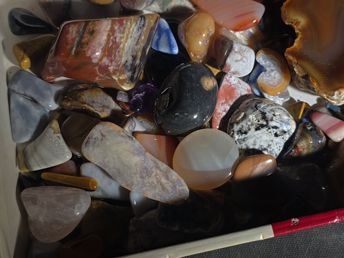 Grouping of Polished Stones and Mineral Specimens including Agate Slices, Tiger's Eye, Jasper, and Amethyst