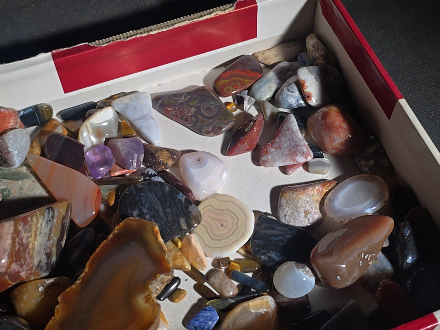 Grouping of Polished Stones and Mineral Specimens including Agate Slices, Tiger's Eye, Jasper, and Amethyst