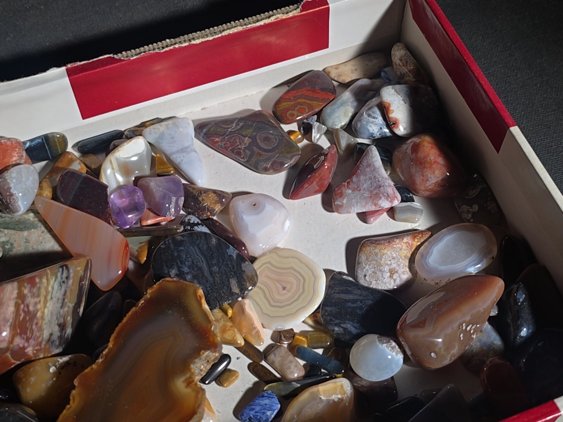 Grouping of Polished Stones and Mineral Specimens including Agate Slices, Tiger's Eye, Jasper, and Amethyst