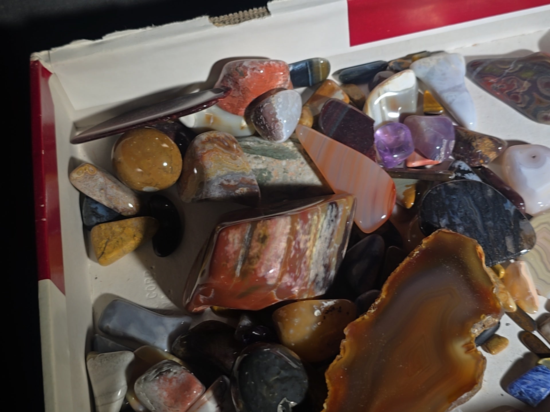 Grouping of Polished Stones and Mineral Specimens including Agate Slices, Tiger's Eye, Jasper, and Amethyst
