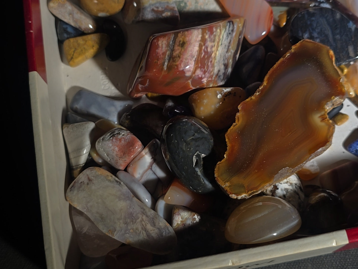 Grouping of Polished Stones and Mineral Specimens including Agate Slices, Tiger's Eye, Jasper, and Amethyst