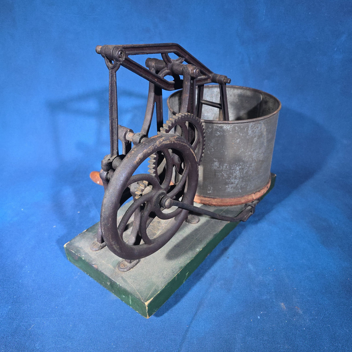 Antique Cast Iron Hand-Crank Mixer on Green-Painted Wood Base with Tin Bucket and Turned Wood Handle
