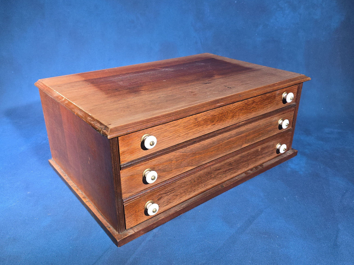 Antique Three-Drawer Spool Cabinet with Porcelain Knobs