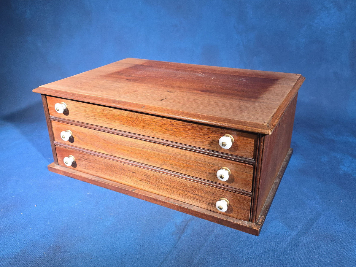 Antique Three-Drawer Spool Cabinet with Porcelain Knobs