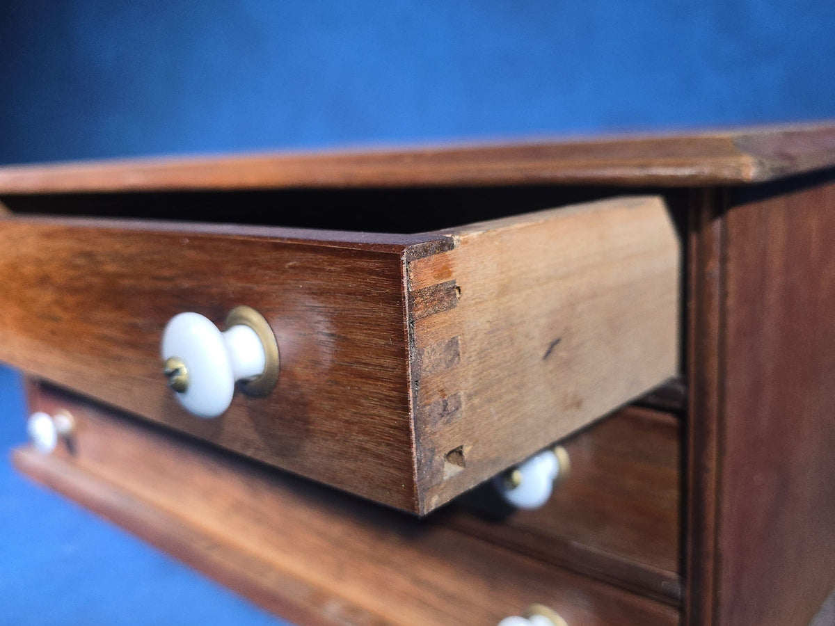 Antique Three-Drawer Spool Cabinet with Porcelain Knobs