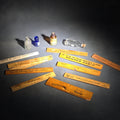 Lot 190 - Grouping of 14 Antique and Vintage Smalls Including 10 Wooden Advertising Rulers and Four Small Glass Bottles