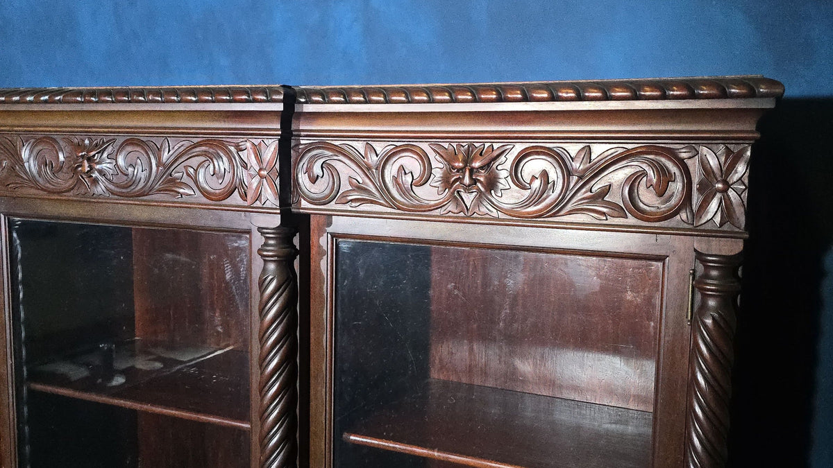 Antique Carved Three-Door Glass-Front Bookcase with Green Man Masks, Rope-Twist Columns, and Claw-and-Ball Feet
