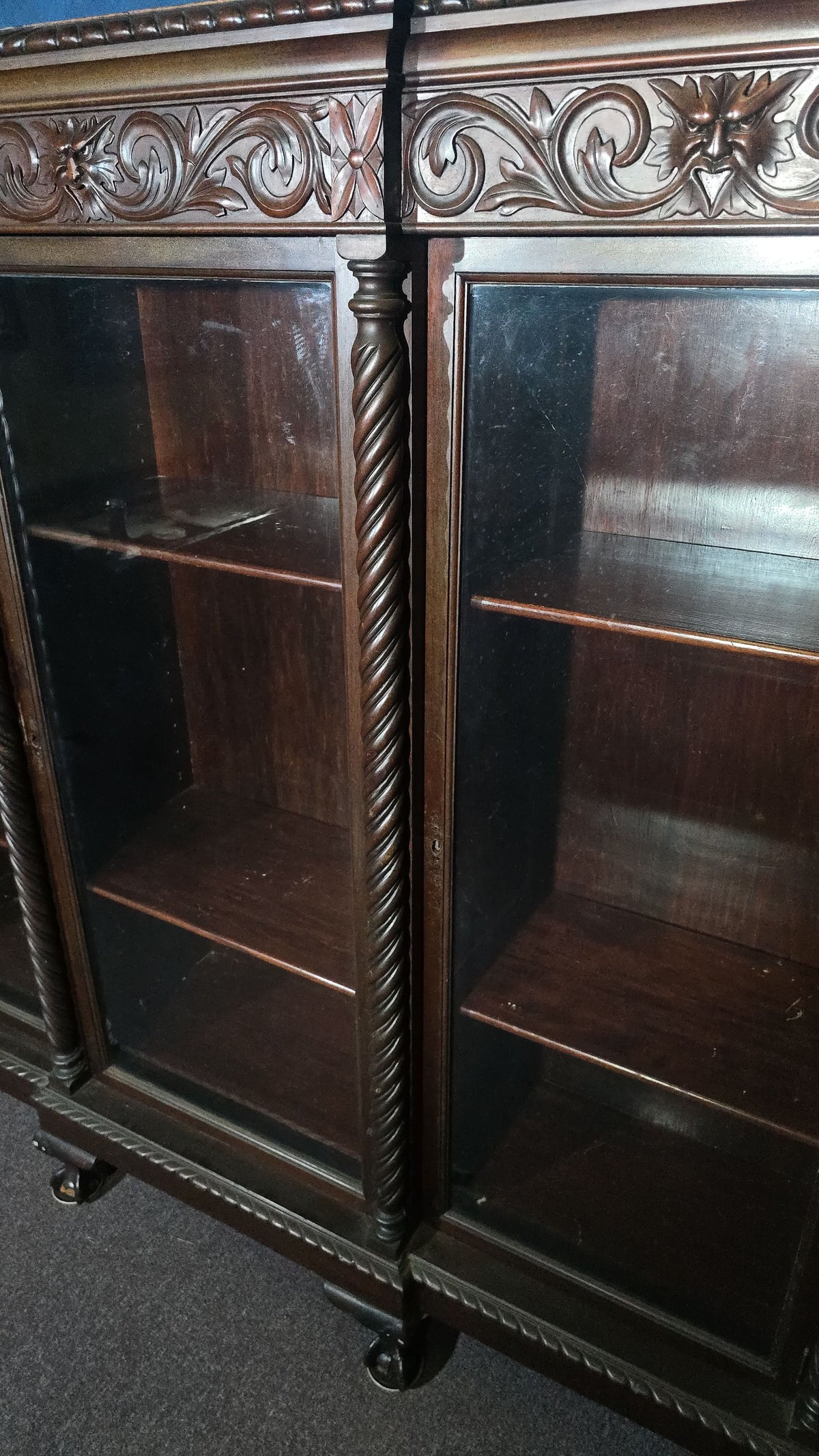 Antique Carved Three-Door Glass-Front Bookcase with Green Man Masks, Rope-Twist Columns, and Claw-and-Ball Feet