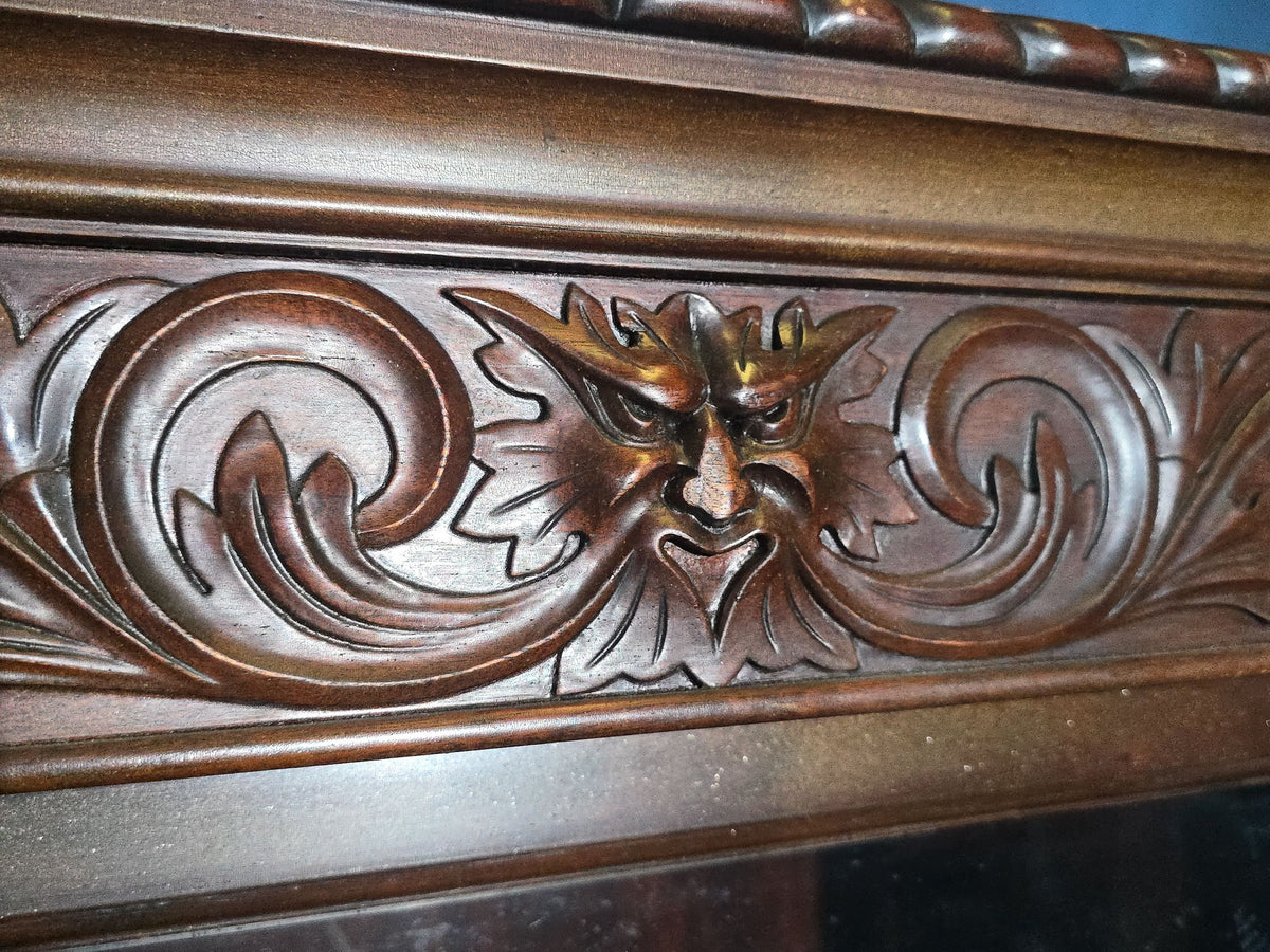 Antique Carved Three-Door Glass-Front Bookcase with Green Man Masks, Rope-Twist Columns, and Claw-and-Ball Feet