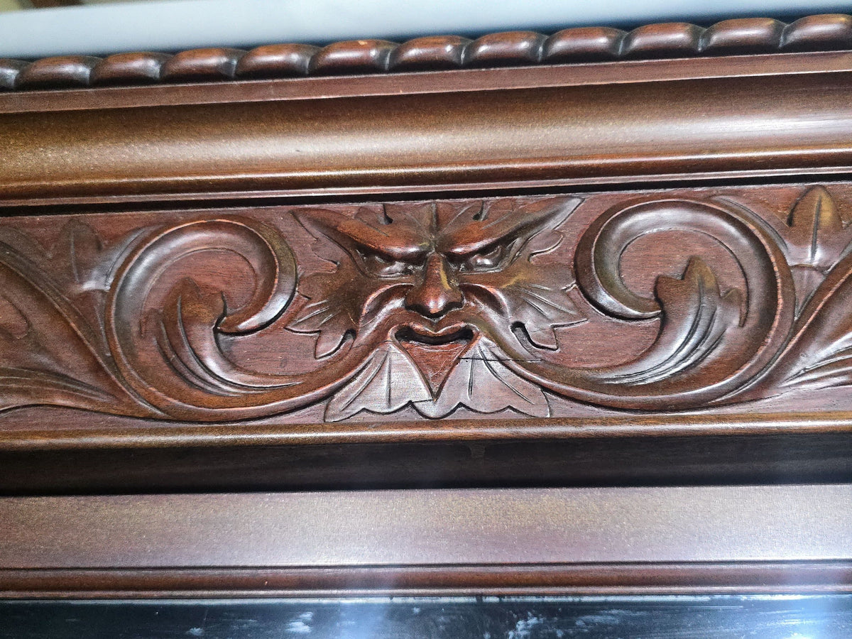 Antique Carved Three-Door Glass-Front Bookcase with Green Man Masks, Rope-Twist Columns, and Claw-and-Ball Feet