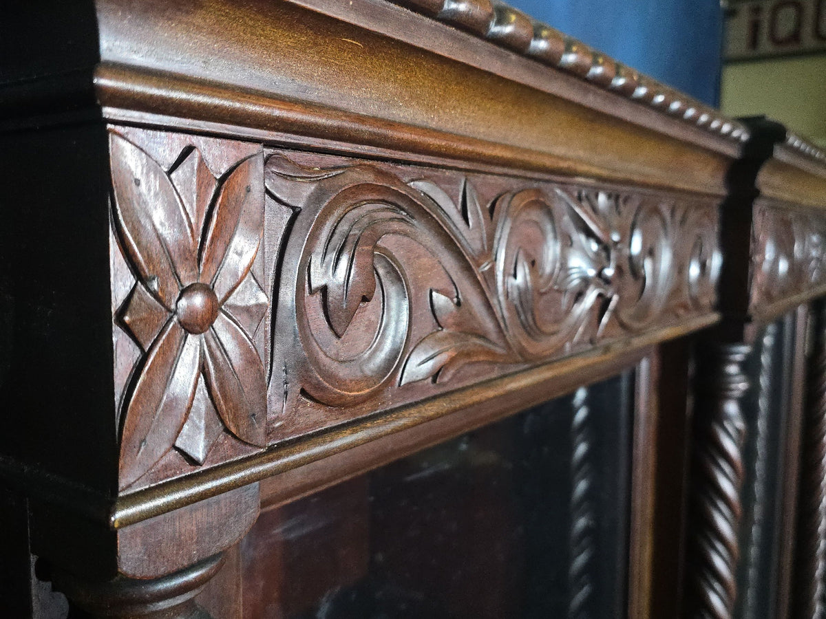Antique Carved Three-Door Glass-Front Bookcase with Green Man Masks, Rope-Twist Columns, and Claw-and-Ball Feet