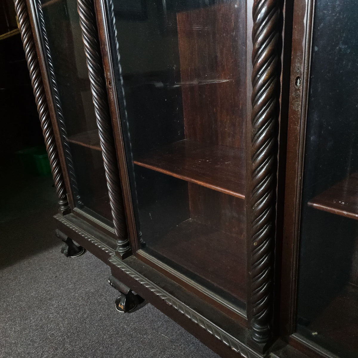 Antique Carved Three-Door Glass-Front Bookcase with Green Man Masks, Rope-Twist Columns, and Claw-and-Ball Feet