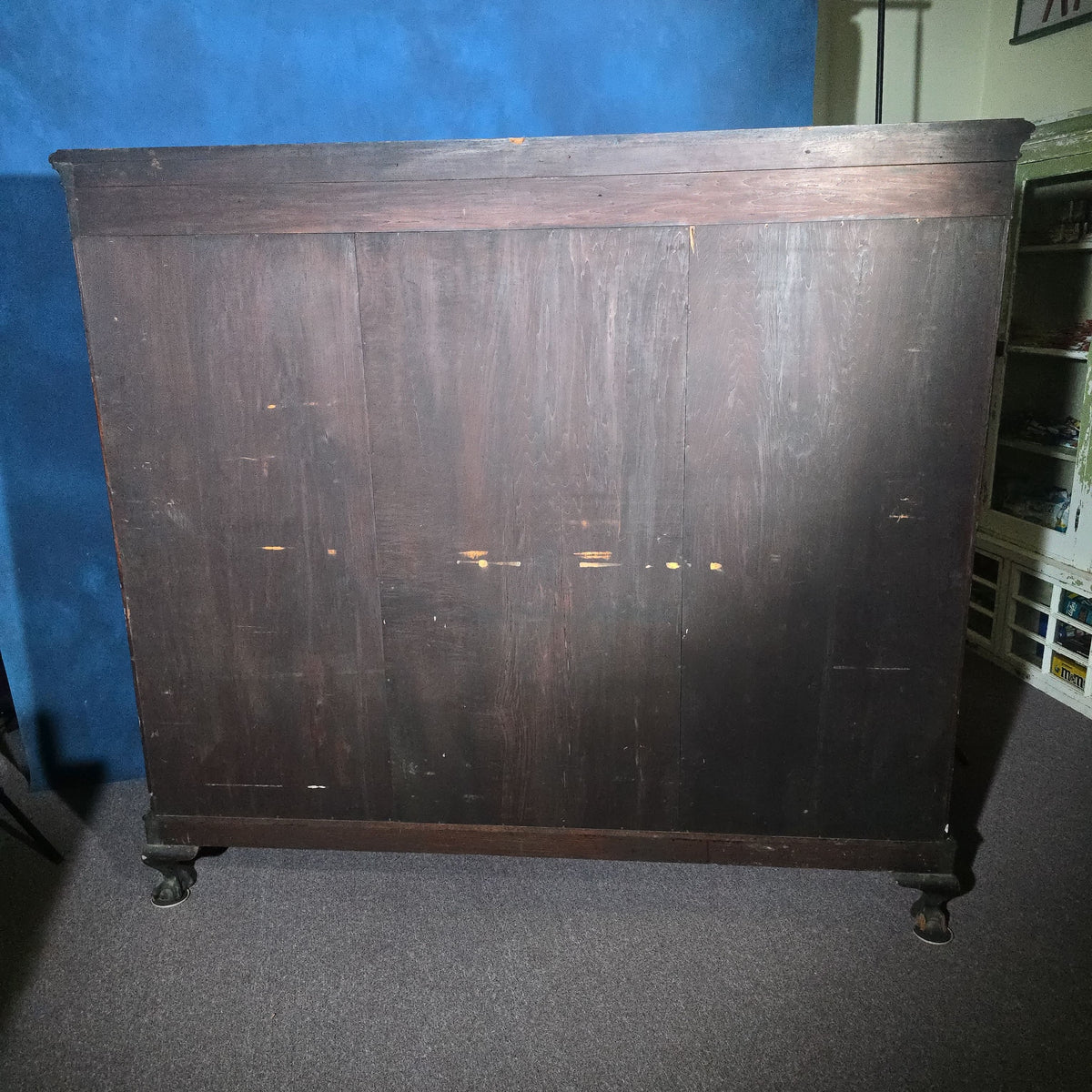Antique Carved Three-Door Glass-Front Bookcase with Green Man Masks, Rope-Twist Columns, and Claw-and-Ball Feet