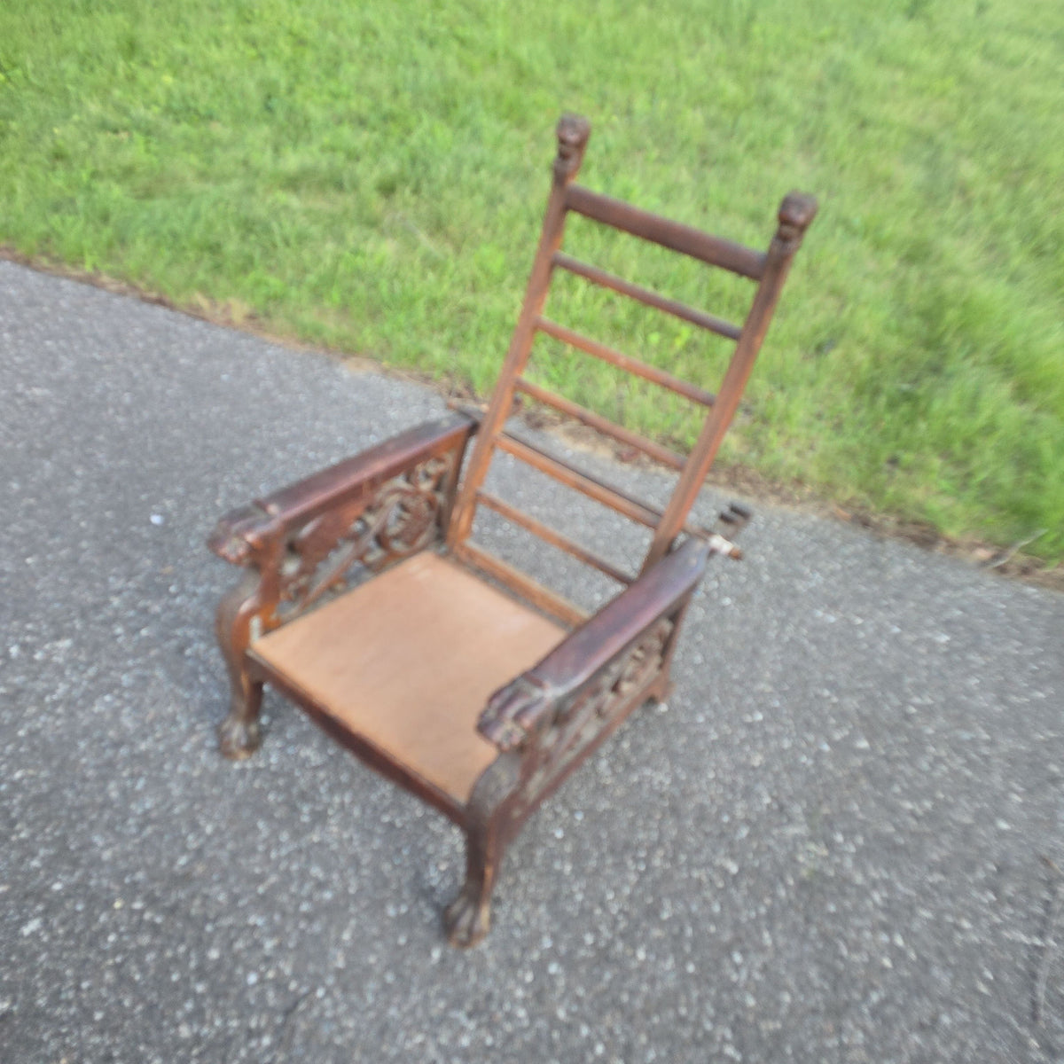 Antique Carved Oak Morris Chair with Lion Heads and Paw Feet