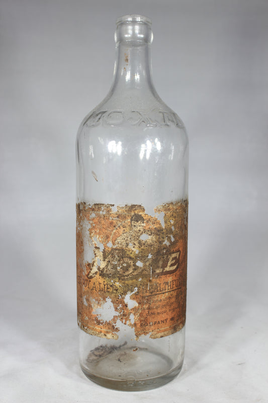 Vintage Moxie Glass Soda Bottle with Partial Label