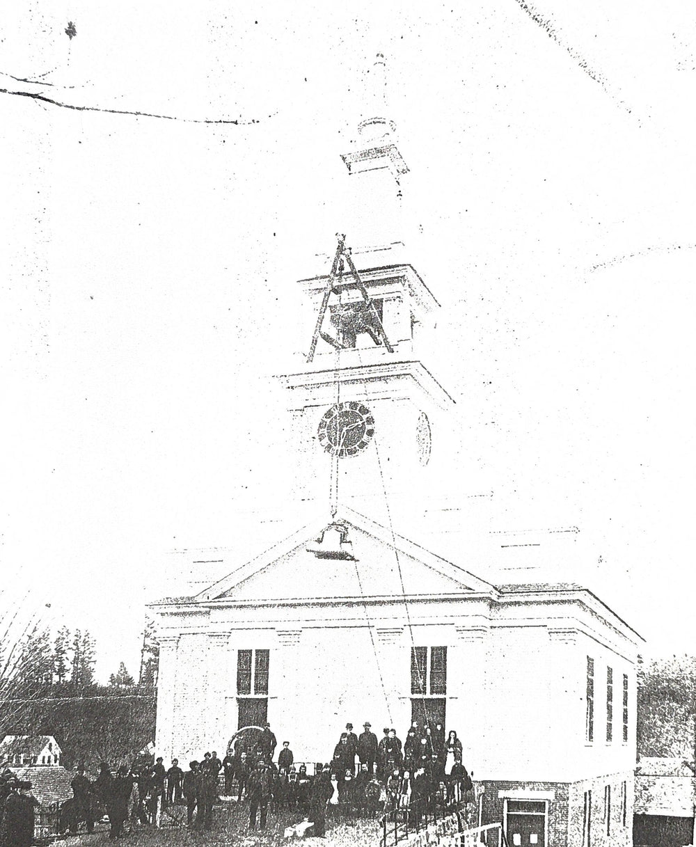 The bell hoisted into the belfry of the original church, c. 1890s