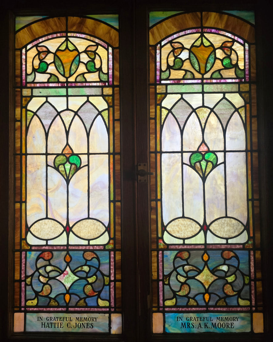 Paired windows for Hattie C. Jones and Mrs. A. K. Moore