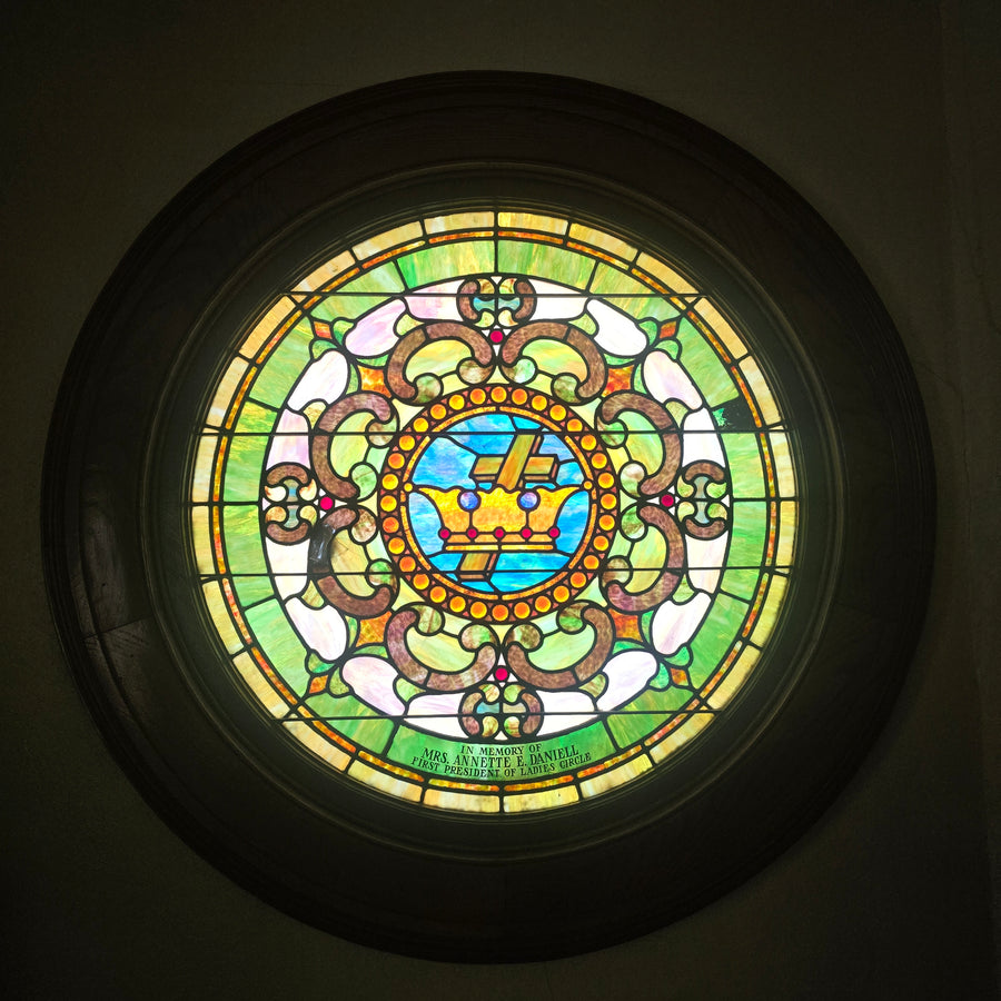 Round window in the reception room in memory of Annette C. Daniell