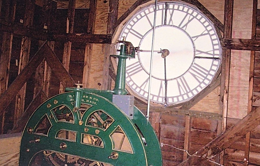 The clock movement and dial back in place inside the tower